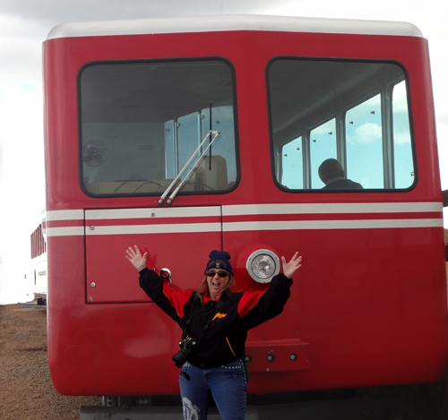 Karen Duquette on the tracks in front of the Manitou cog train