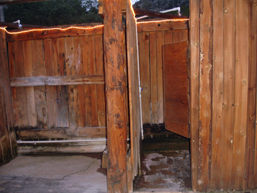 The shower area  behind the spas