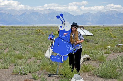 Karen Duquette and a blue party alien