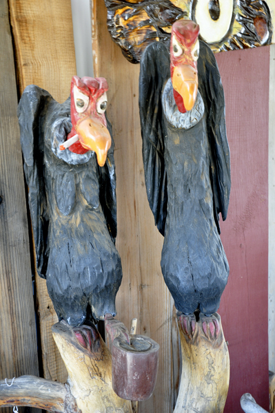 two buzzards wood sculpture