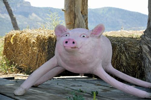 pink pig wood sculpture