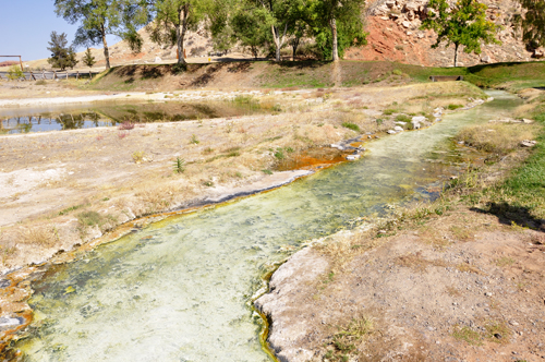 water flowing beside the boardwal