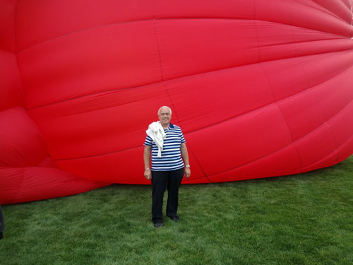 Lee Duquette by a partially blown-up hot ait balloon.