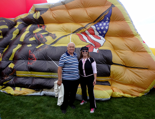 The two RV Gypsies by a partially blown-up hot ait balloon.