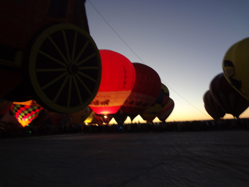 two hot air balloons glowing