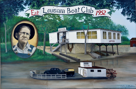 a Louisiana Boat Club mural on a building in Louisiana, Missouri