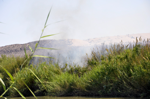 a wildfire on the other side of the Rio Grande River (in Mexico)