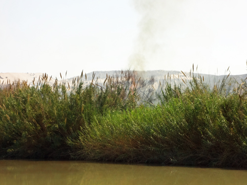 a wildfire on the other side of the Rio Grande River (in Mexico)