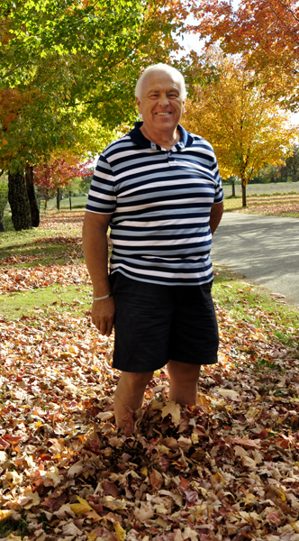 Lee Duquette with his feet buried in the leaves