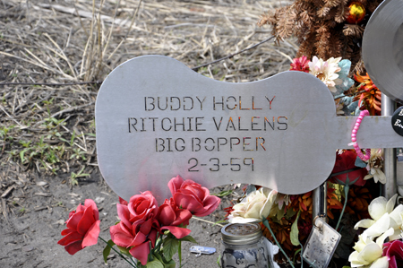 steel guitar engraved with names of Buddy Holly, Ritchie Valens, and Big Bopper