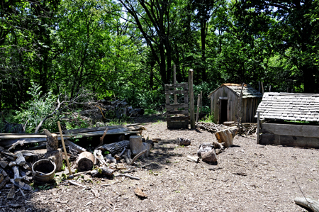 Behind the 1850 Pioneer Farm log cabin