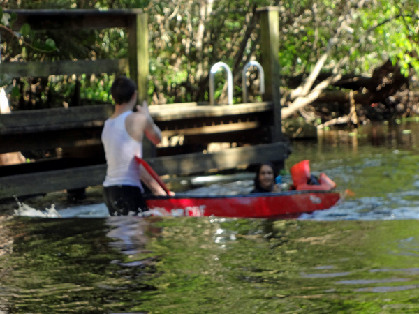 Josh and Sam trying to upright the canoe