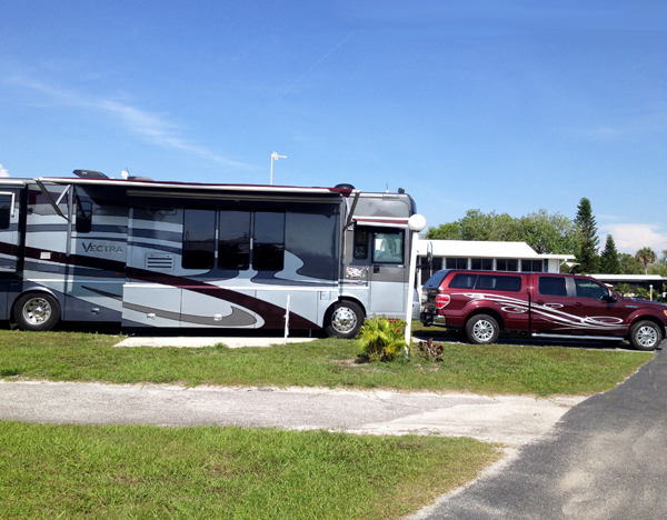 The RV and toad of the two RV Gypsies at Manatee Encore RV Resort
