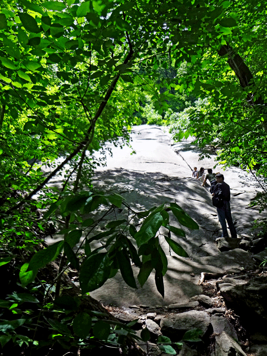 giant boulder alongside the trail