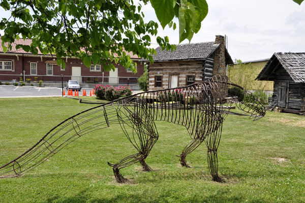 a wire dinosaur - art in Old Town
