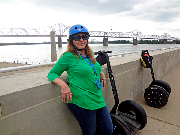 Karen Duquette by her Segaway on the Bridge