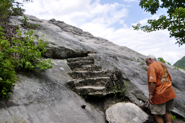 Lee Duquette looks at the steps to one of the Chained Rocks