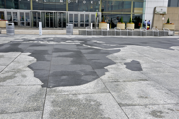 Shapes like continents on the ground outside the GM Building