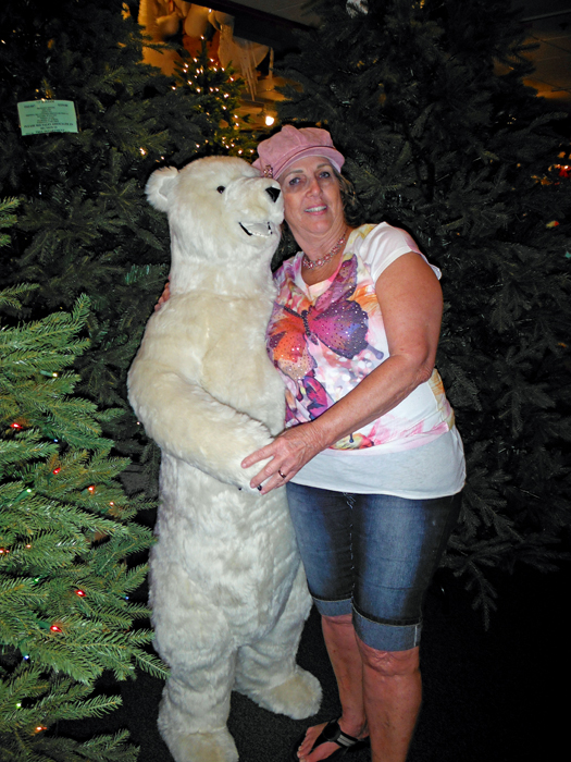 Karen Duquette dances with the polar bear
