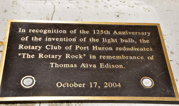 plaque about a big rock dedicated to the invention of the light bulb.