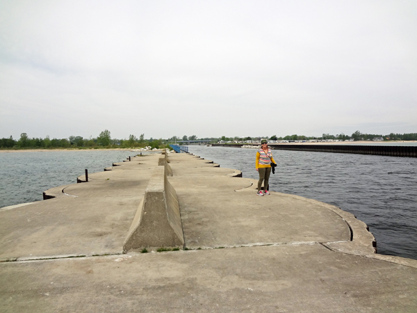 Karen Duquette on Au Sable Harbor Pier