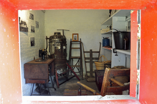 Looking through an open window into the Sturgeon Point Lightouse