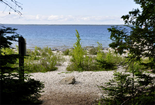 Lake Michigan and a stone in the ground