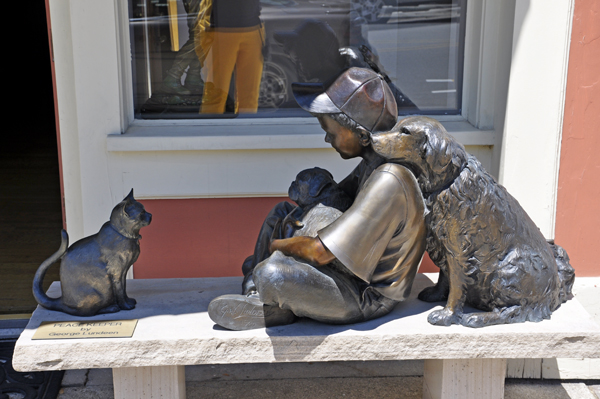 staute in front of stores at Harbor Spings, Michigan