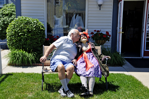 Lee Duquette kisses a very fashionable lady in Harbor Springs