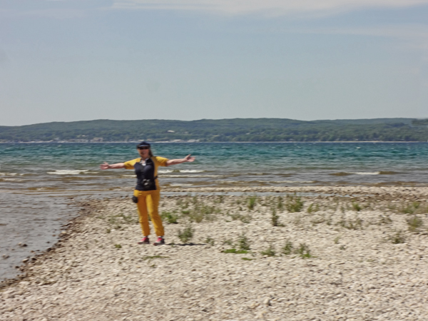 Karen Duquette on the beach at Traverse Bay