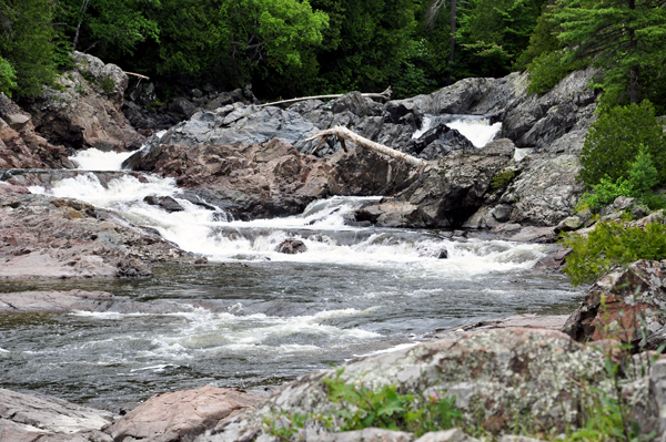 View of Chippewa Falls from the trail along side the falls