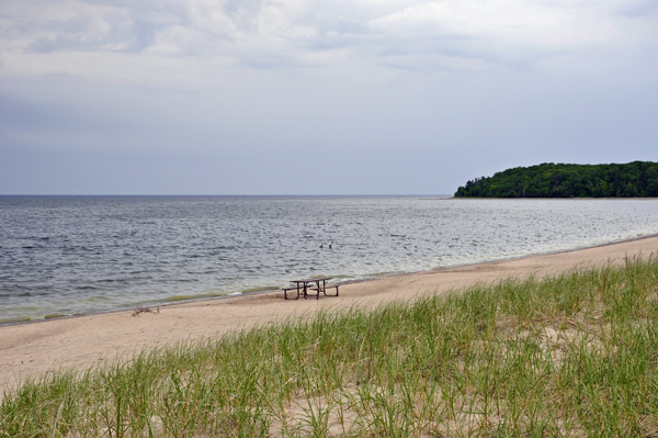 One lone picnic table on the beach