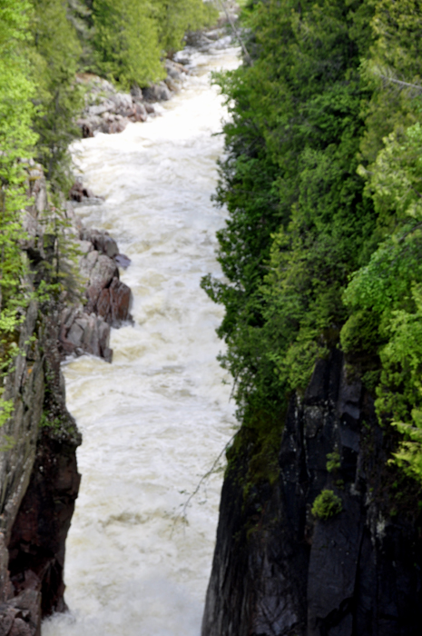 water is flowing uphill due to the force of Aguasbon Dam