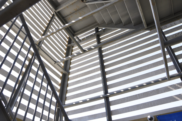 looking through the open slats of the terrace Bay Lighthouse