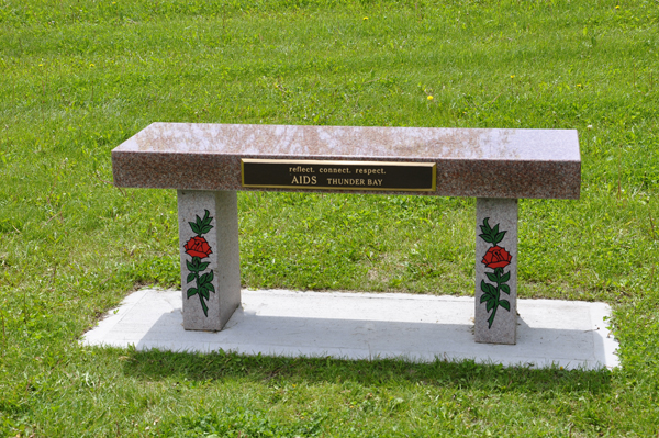 a bench dedicated to aids