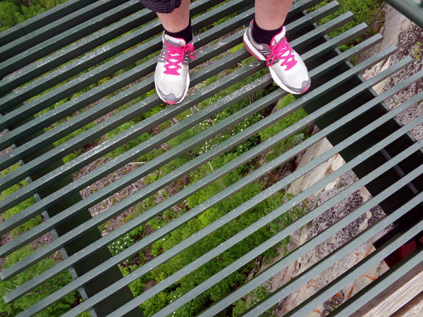 Karen DuquetteĀ looking down through the grate