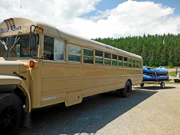 The bus and rafts ready to load and go