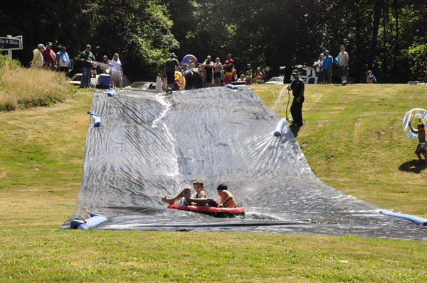 children on the slip and slide