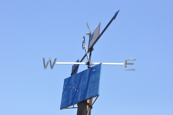 The weather-vane has a replica of the Alaska flag