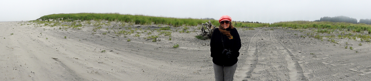 Karen standing where the trail meets the actual beach