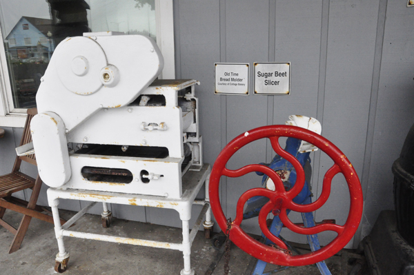 Old time bread molder and sugar beet slicer