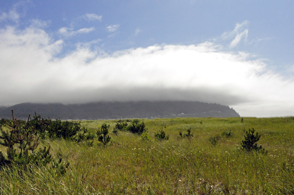 an extremely long cloud layer over the entire horizon.