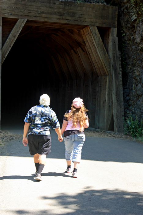 two RV Gypsies as they walk hand-in-hand