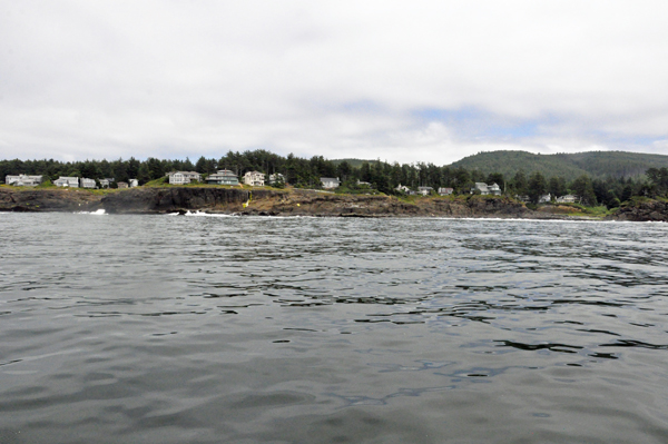 view of the shoreline as the boat enters the Pacific Ocean