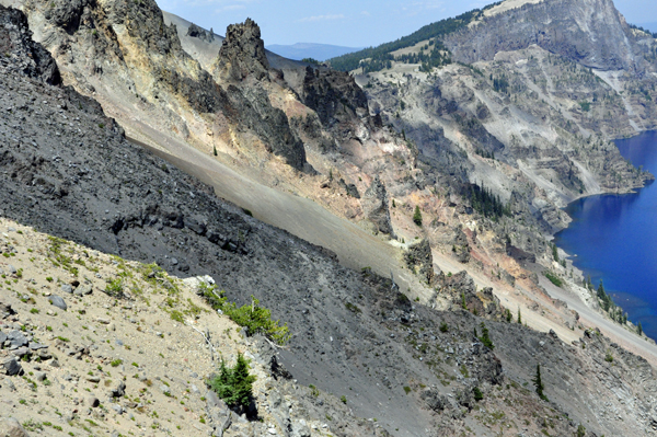 The sharp, colorful lava cliffs surrounding Crater Lake.