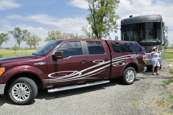 Karen Duquette and her RV and toad