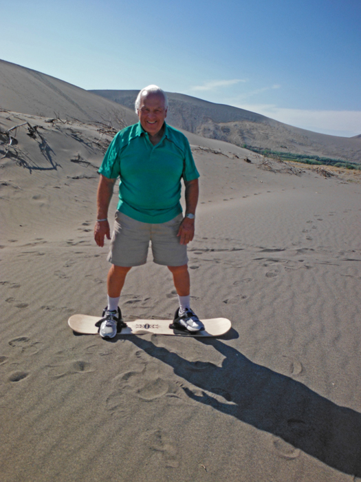 Lee Duquette tries the sand board