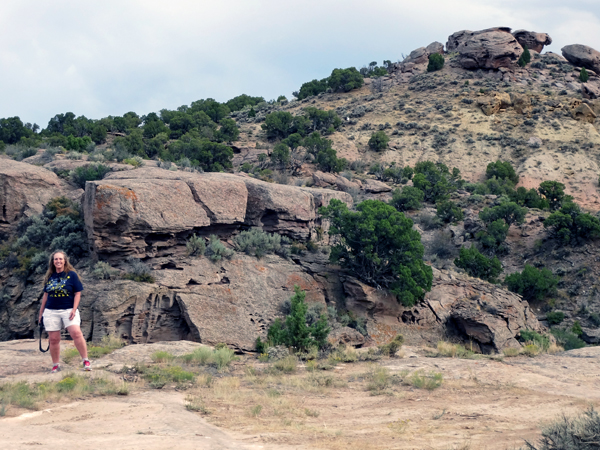 Karen Duquette by the edge of the gorge in the canyon