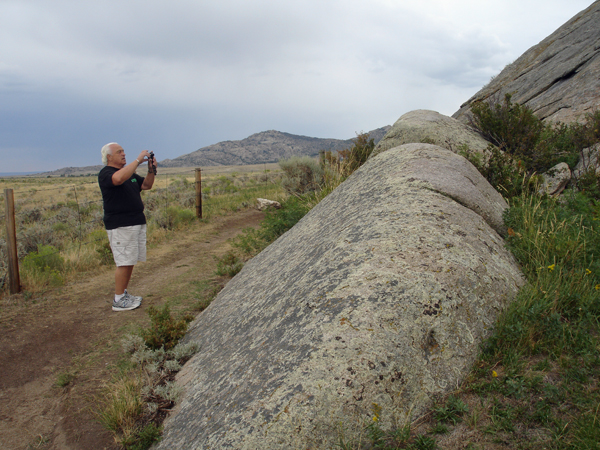 Lee Duquette photographing Independence Rock