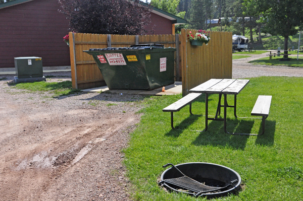 picnic table and dumpster